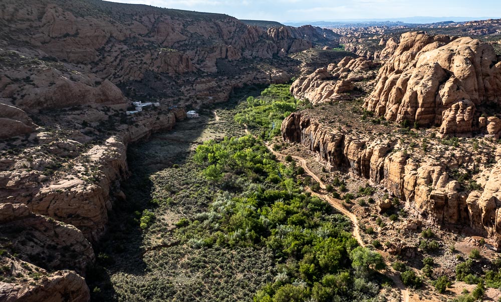 two houses sit in the shadows in Mill Creek near Moab, Utah